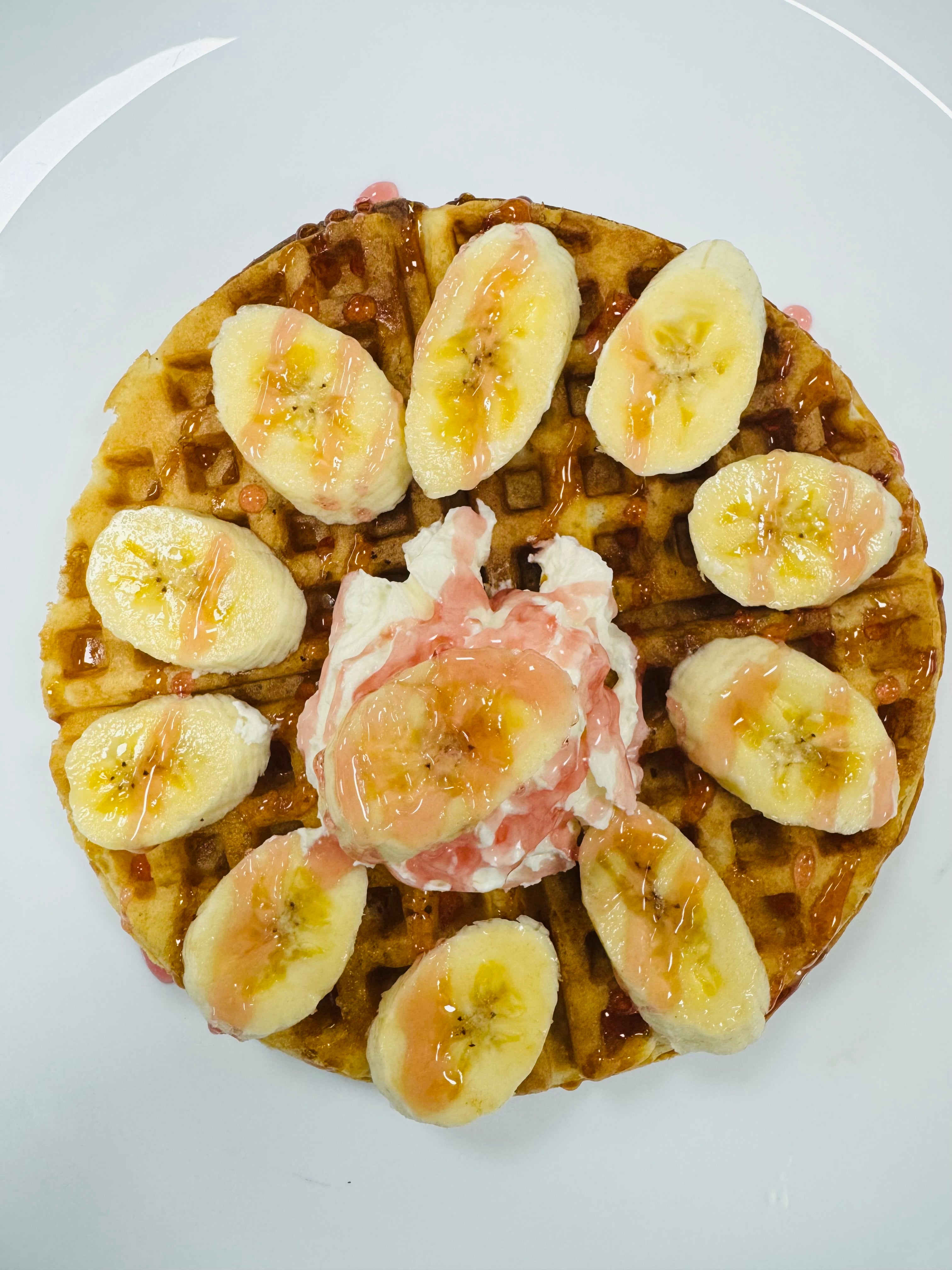 Banana Waffle Delight strawberry sauce