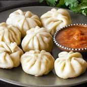 Chicken Momos With Schezwan Sauce