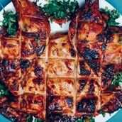 Full chicken grilled on charcoal