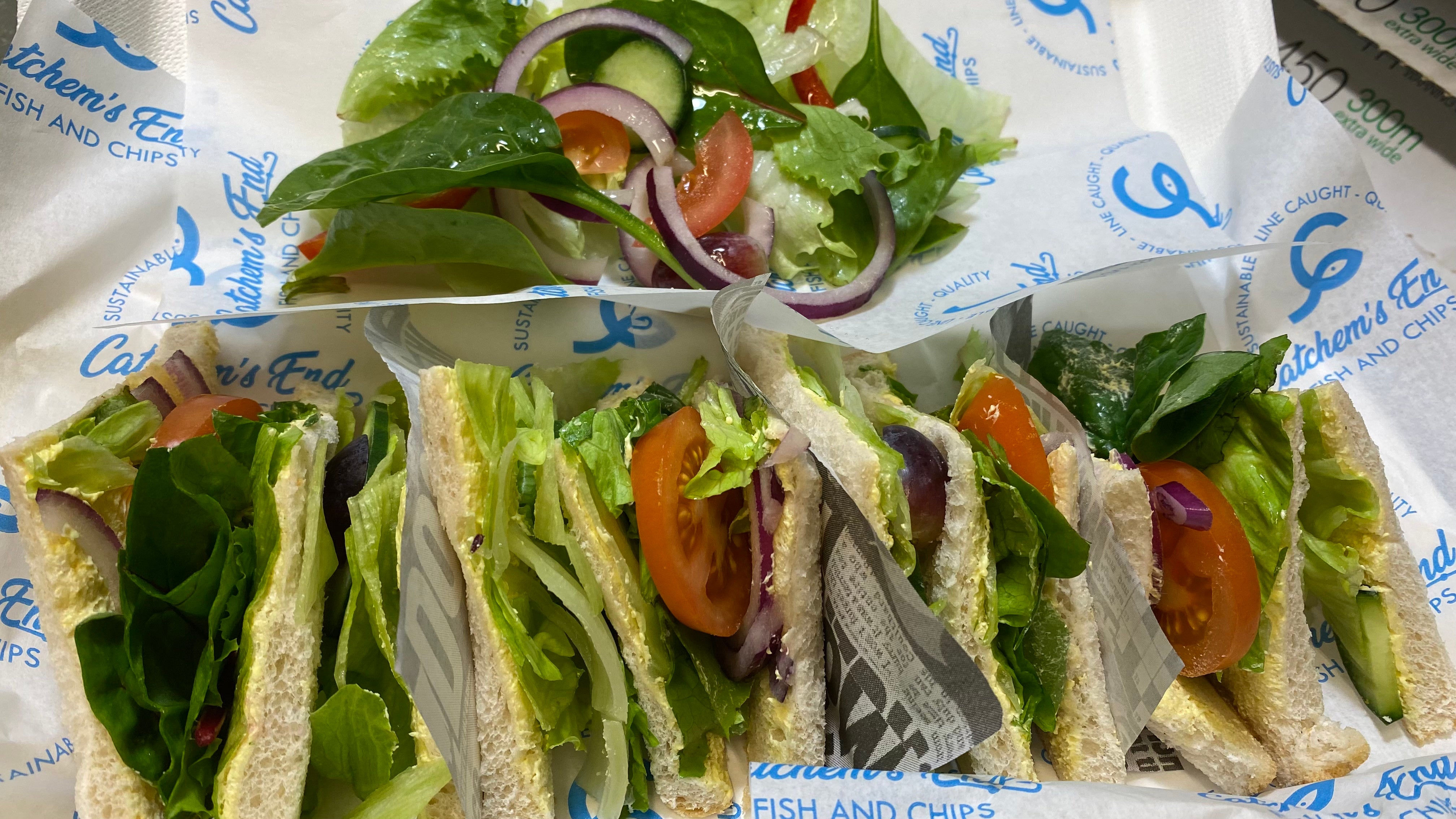 Triple  Salad Sandwich side of salad.