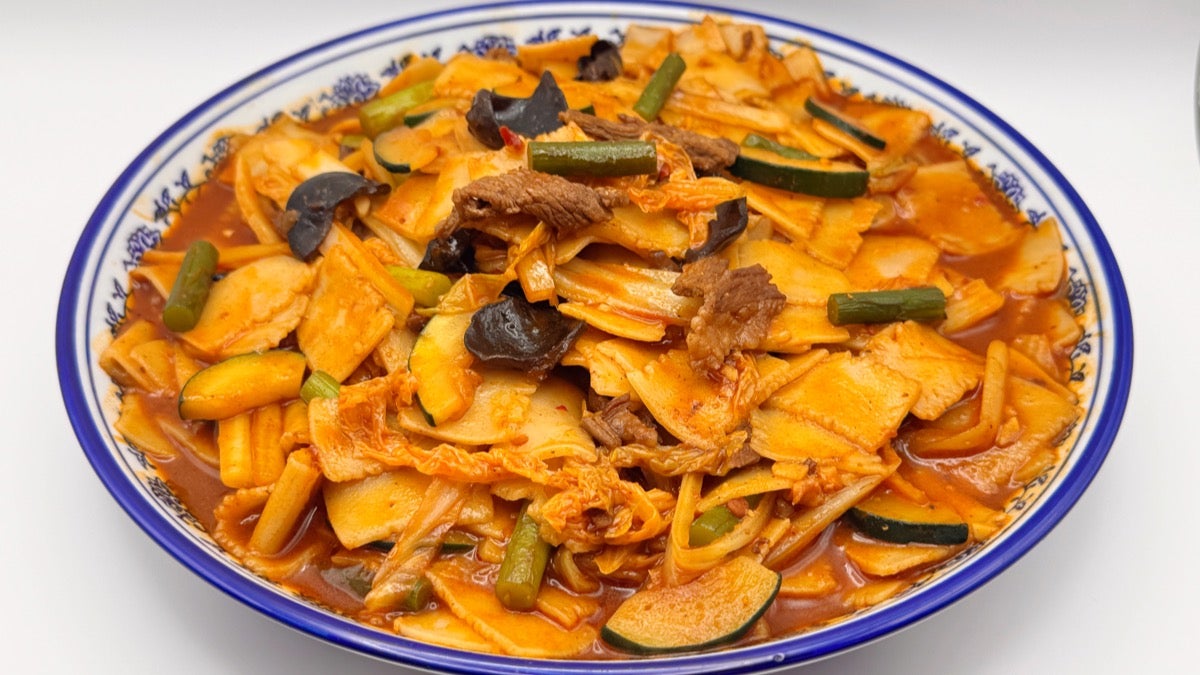 Wok-Fried Hand-Torn Flat Noodle Pieces