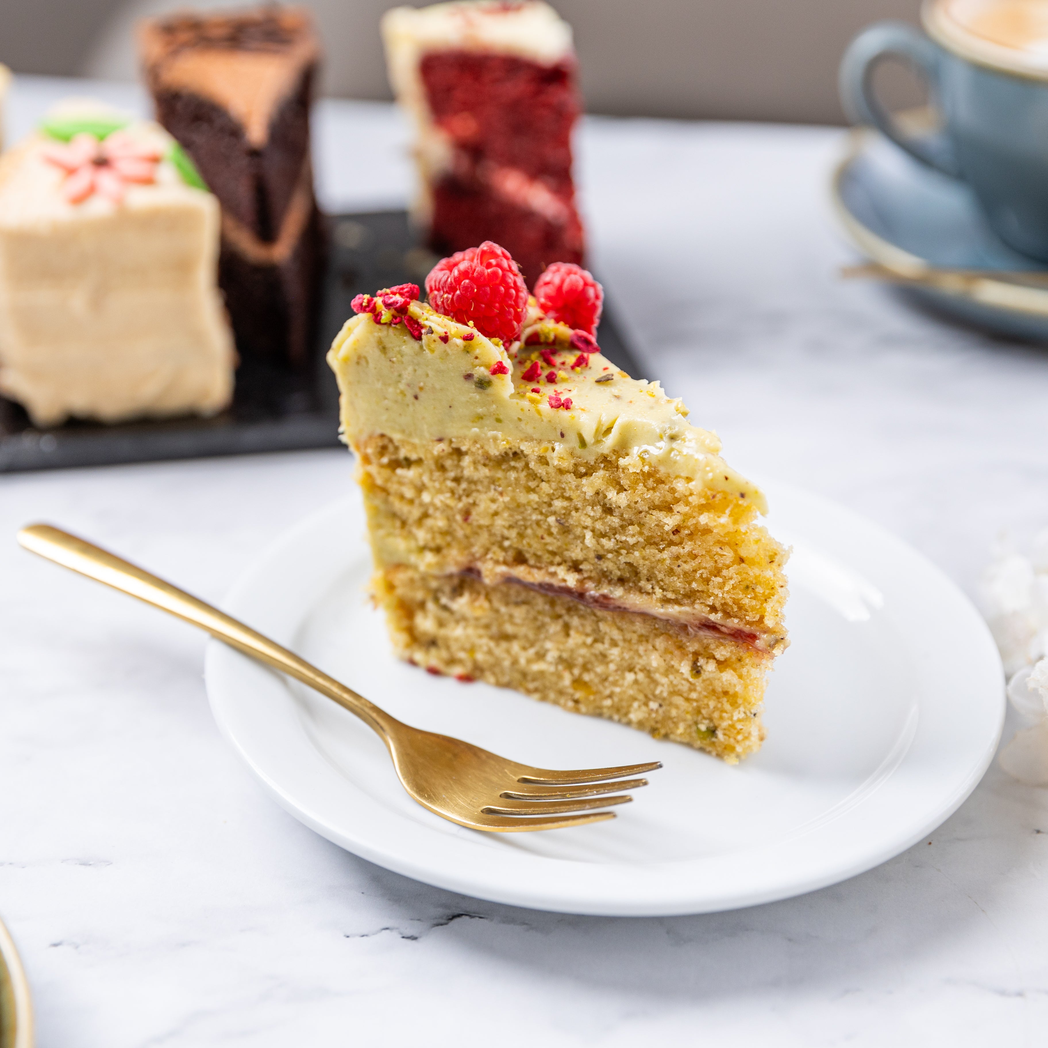 Pistachio & Raspberry Cake Slice