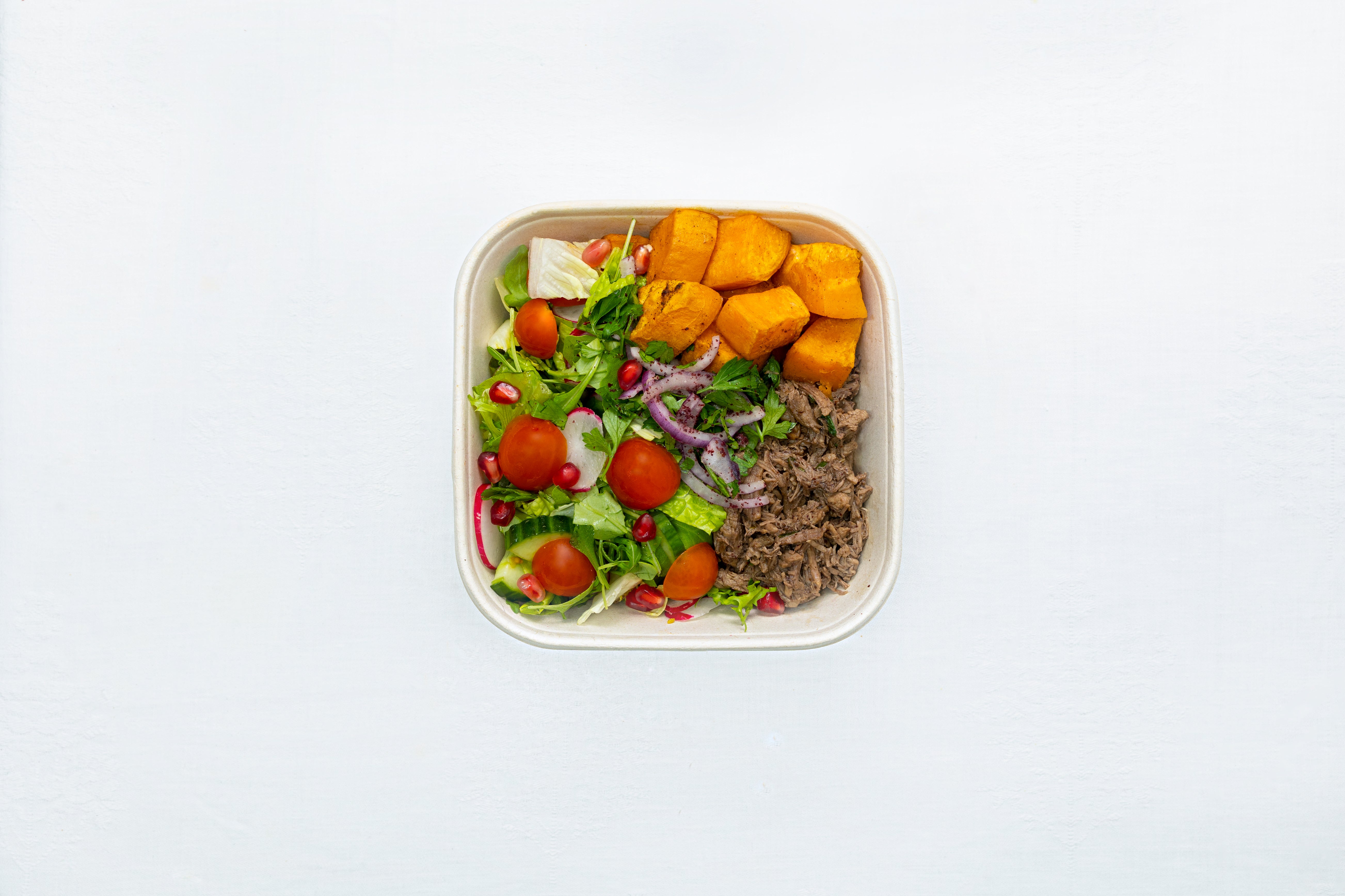 Spiced Pulled Lamb & Roasted Sweet Potato Bowl