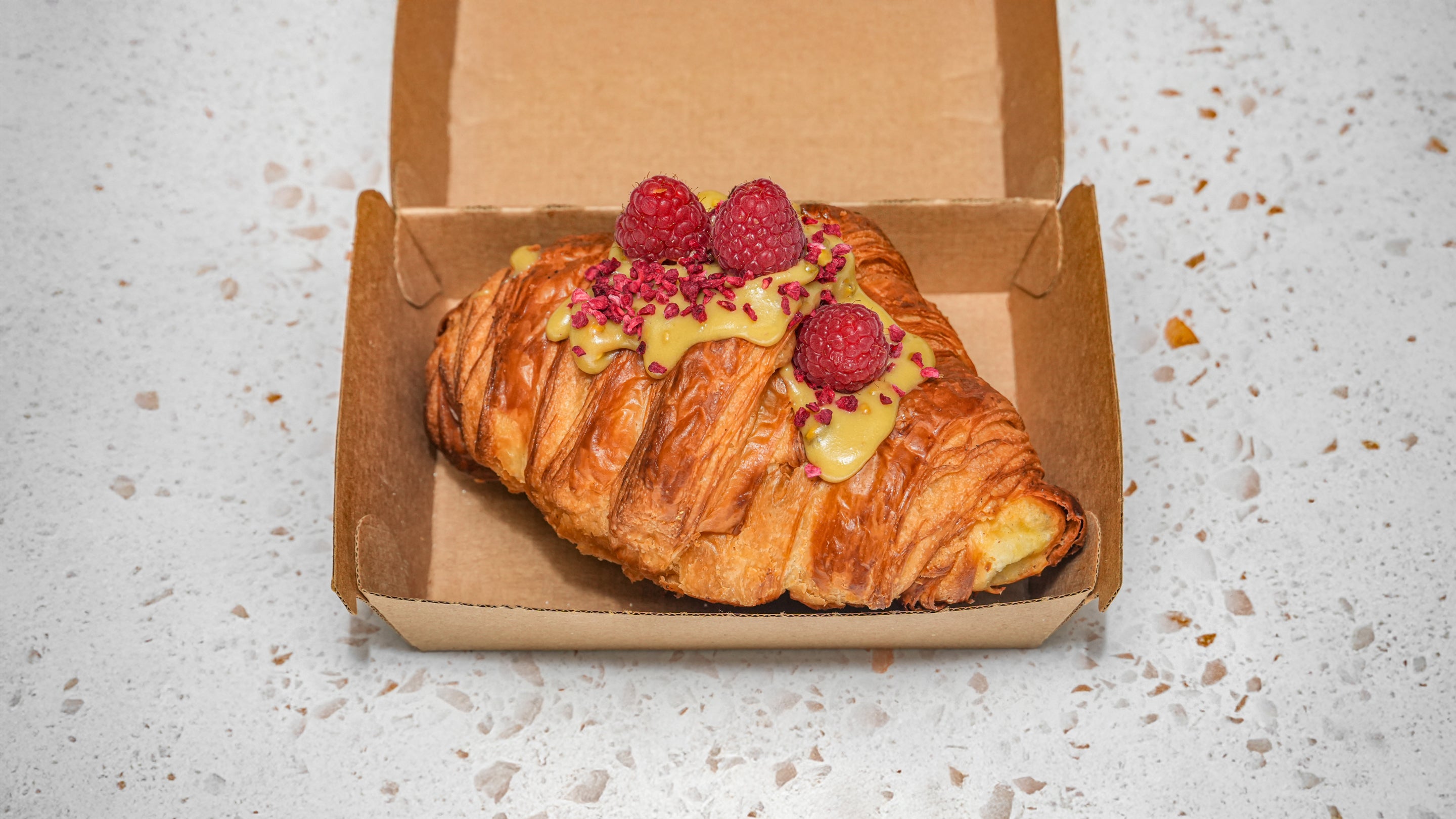 Pistachio and raspberry croissant