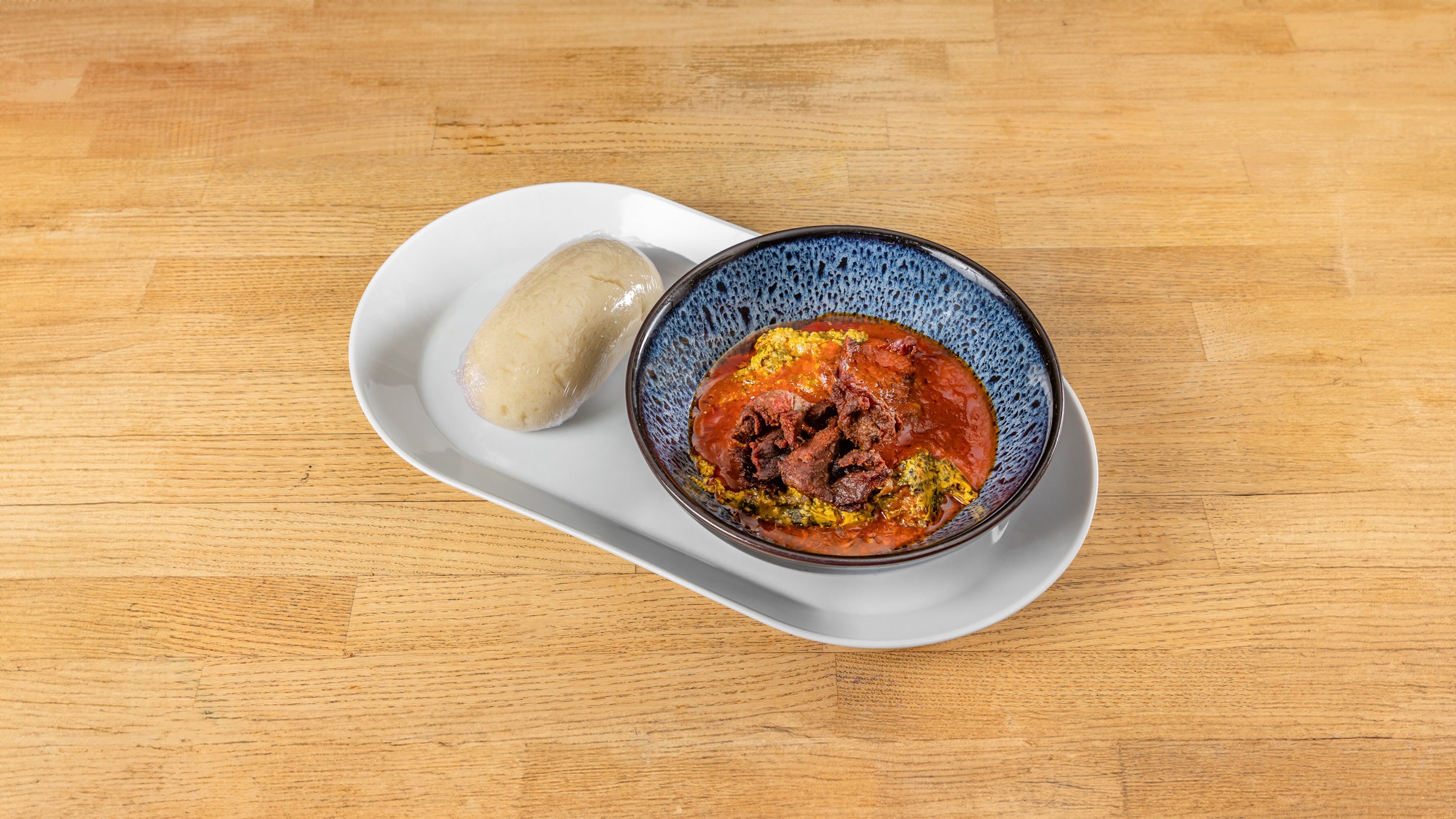 Pounded Yam and Egusi Meat