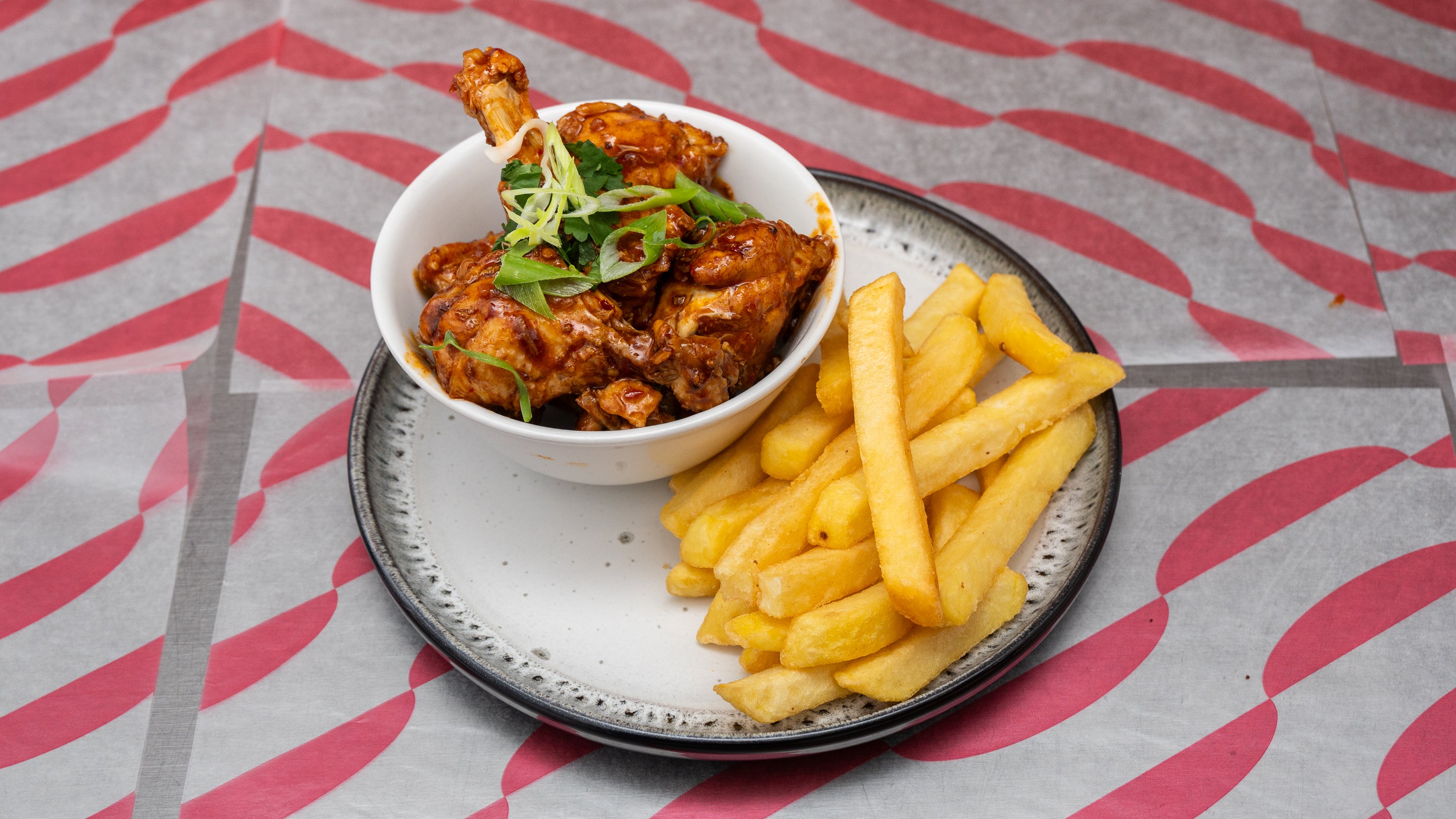 Schezwan Wings (5pcs) and Fries