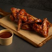 Adobo Glazed Chicken wings- 6pcs.