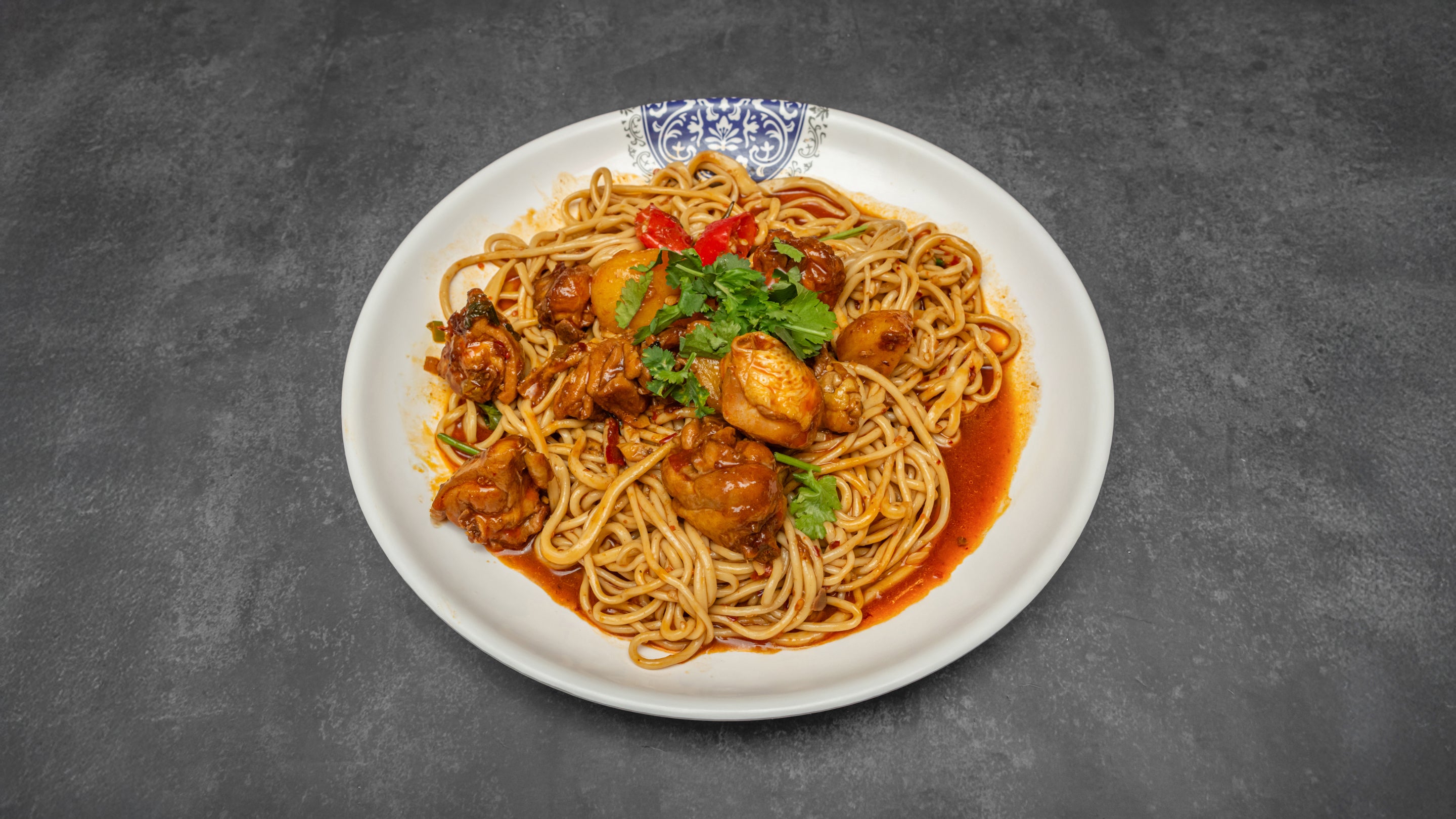 Hand-pulled Noodles with Chicken Legs in Sauce 大盘鸡拌面