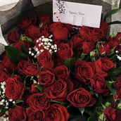 A Bouquet Of Red Roses And Beautiful Red Baby Roses