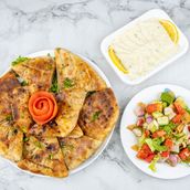 Stuffed Meat Pitas with appetizers