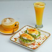 Avocado Toast With Poached Egg And Hollandaise Sauce
