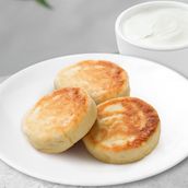 Syrniky (Cottage Cheese Pancakes) With Sour Cream