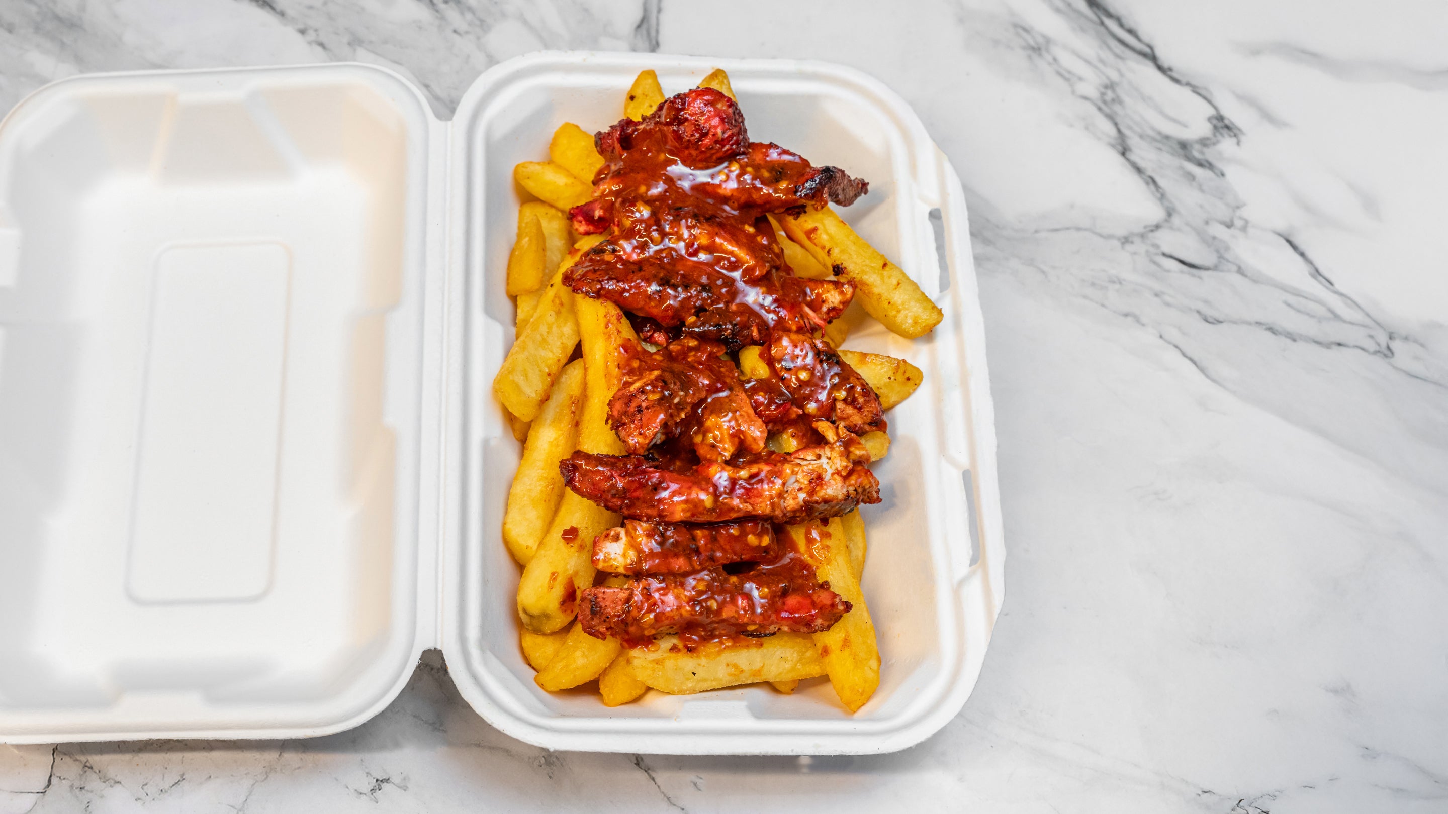 Spicy Chicken Steak on Fries