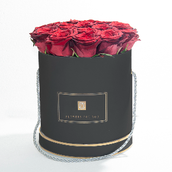 Roses Arranged In Black Round Box