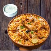 Chicken Biryani Tender chicken with fragrant rice, served with raita and salad. A must try dish