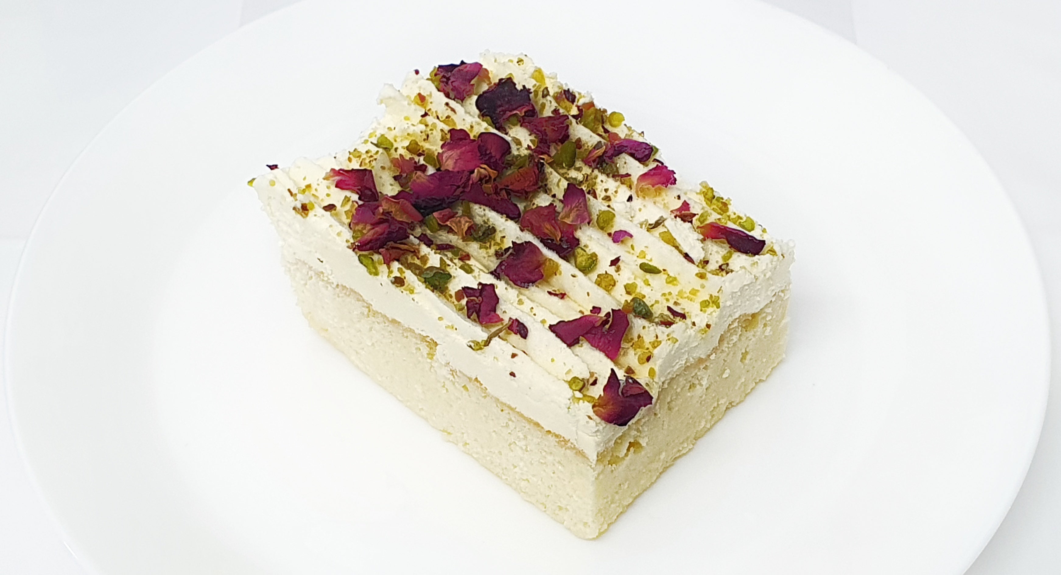 Rose & pistachio milk cake