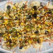 Fajita meal plate, chicken strips with rice, potatoes, sautéed onions and bell peppers