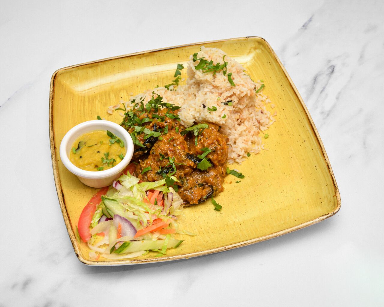 Spiced Tofu & Aubergine rice bowl with salads