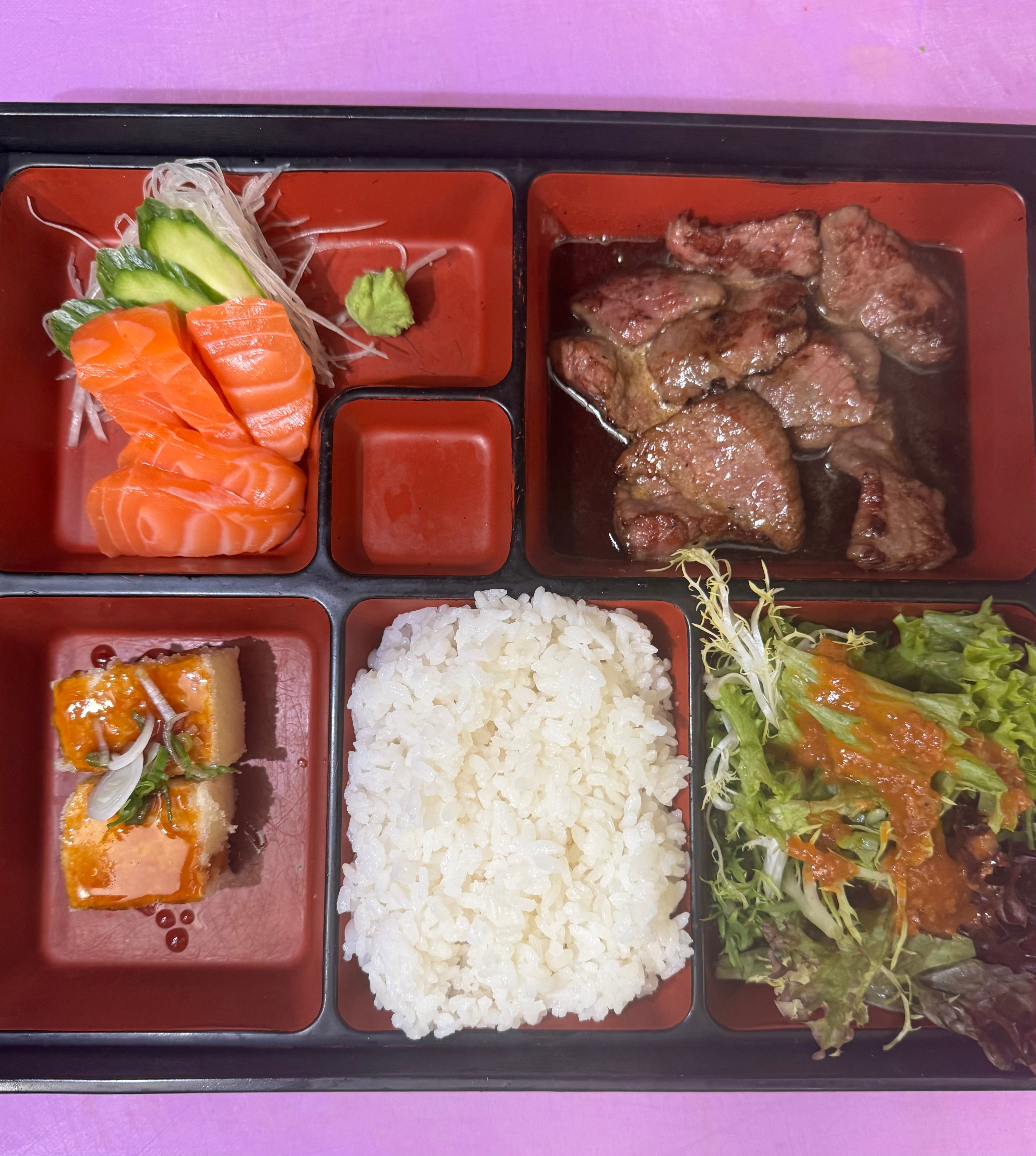Salmon sashimi and beef teriyaki bento