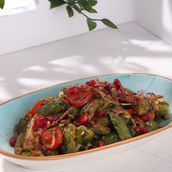 Zucchini Mutabbaa With Pomegranate Molasses
