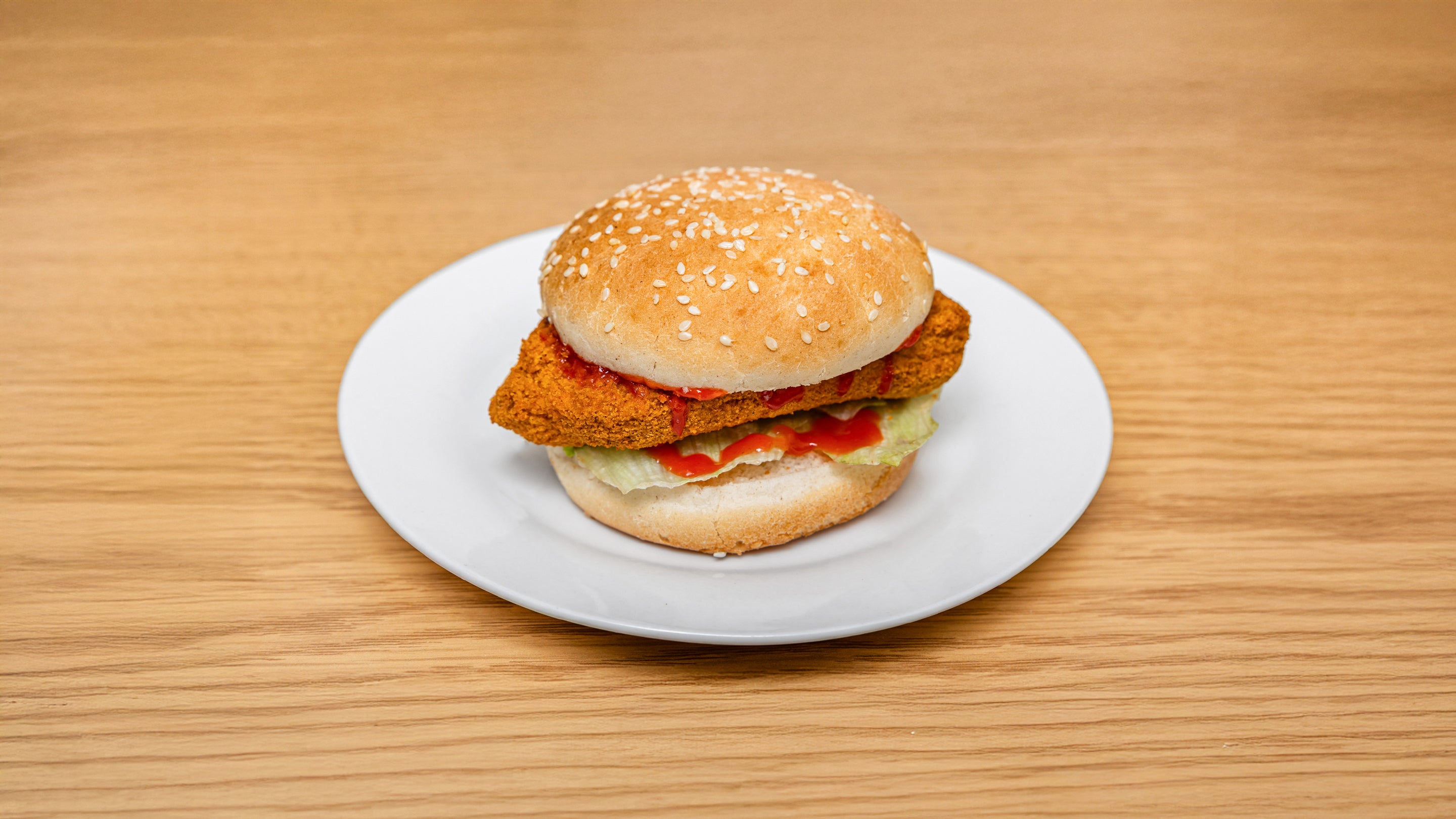 Hot and spicy chicken burger .