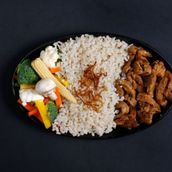 Black Pepper Beef with brown rice and vegetables.