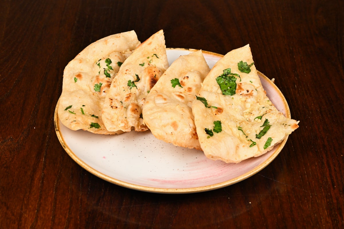 Garlic Naan (contains dairy), (contains gluten)