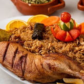 Half duck with orzo soup and rice of your choice