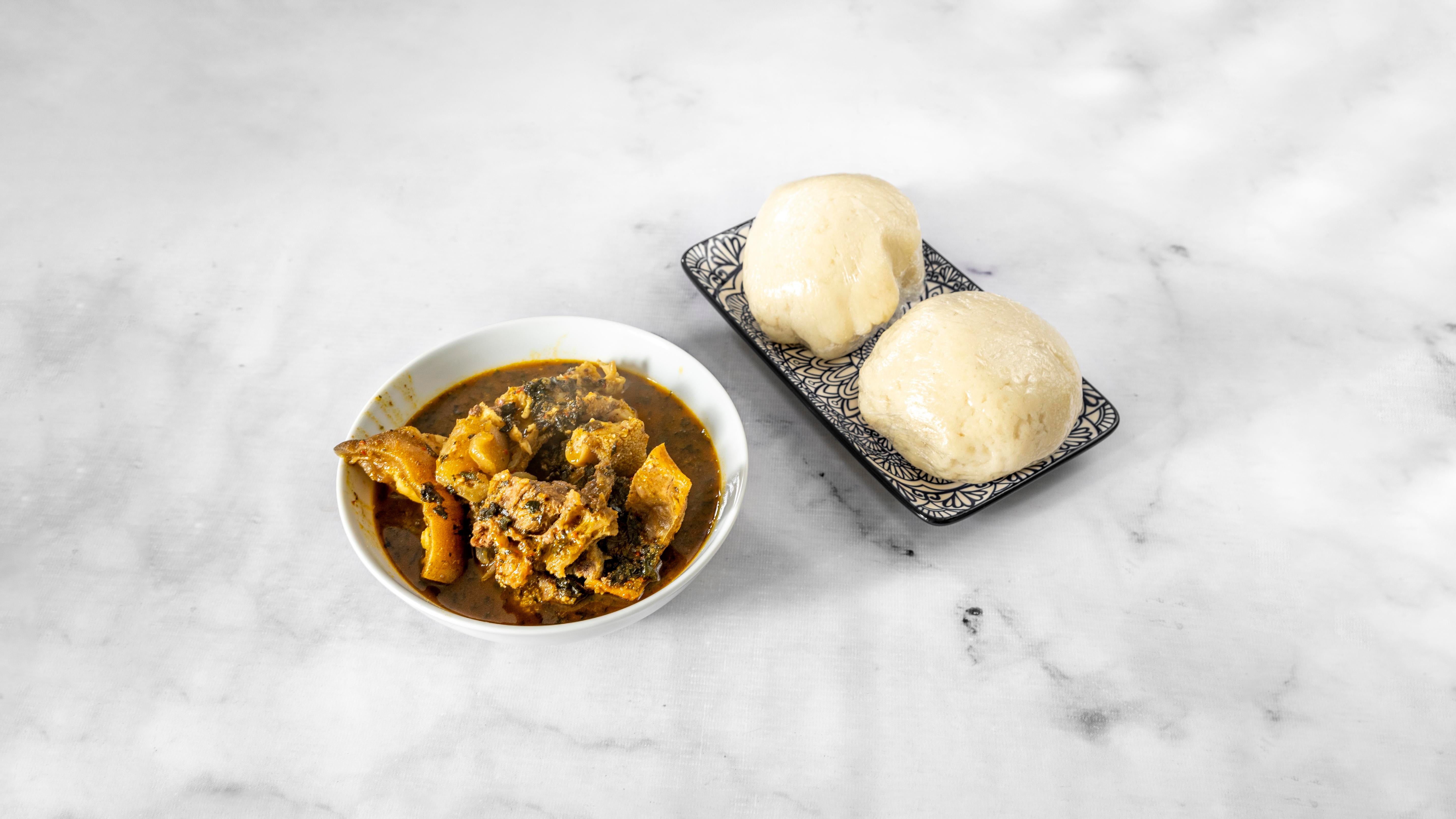 Bitter Leaf Soup with Assorted Meat and Pound Yam