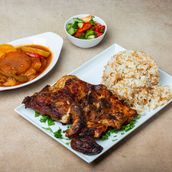 Rice With Oven Potatoes and Half Chicken Grilled on Charcoal