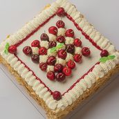 Square Shaped Fruit Cake with Almonds and Cherries
