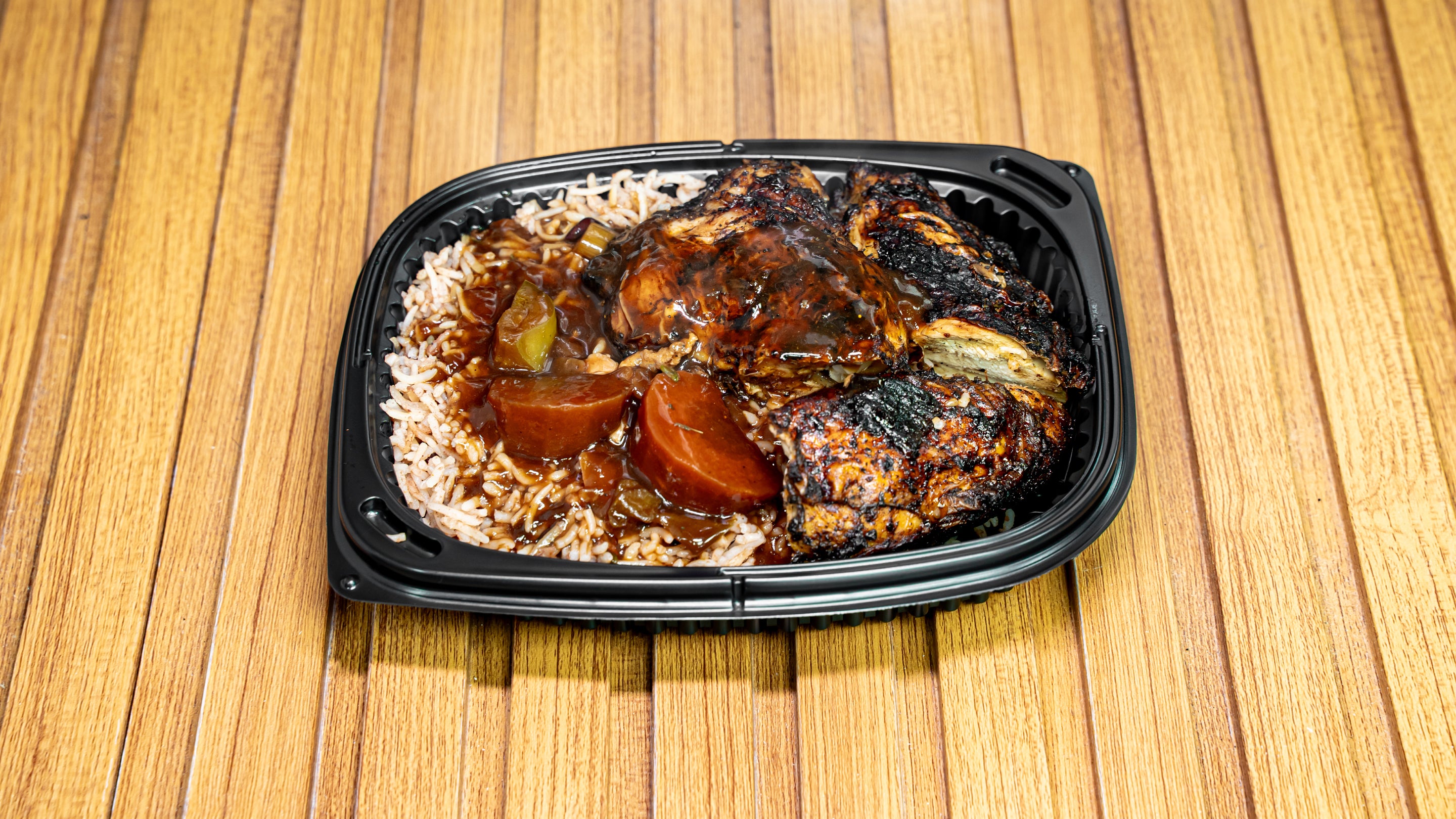 Jerk Chicken – with either White rice or Rice & Peas