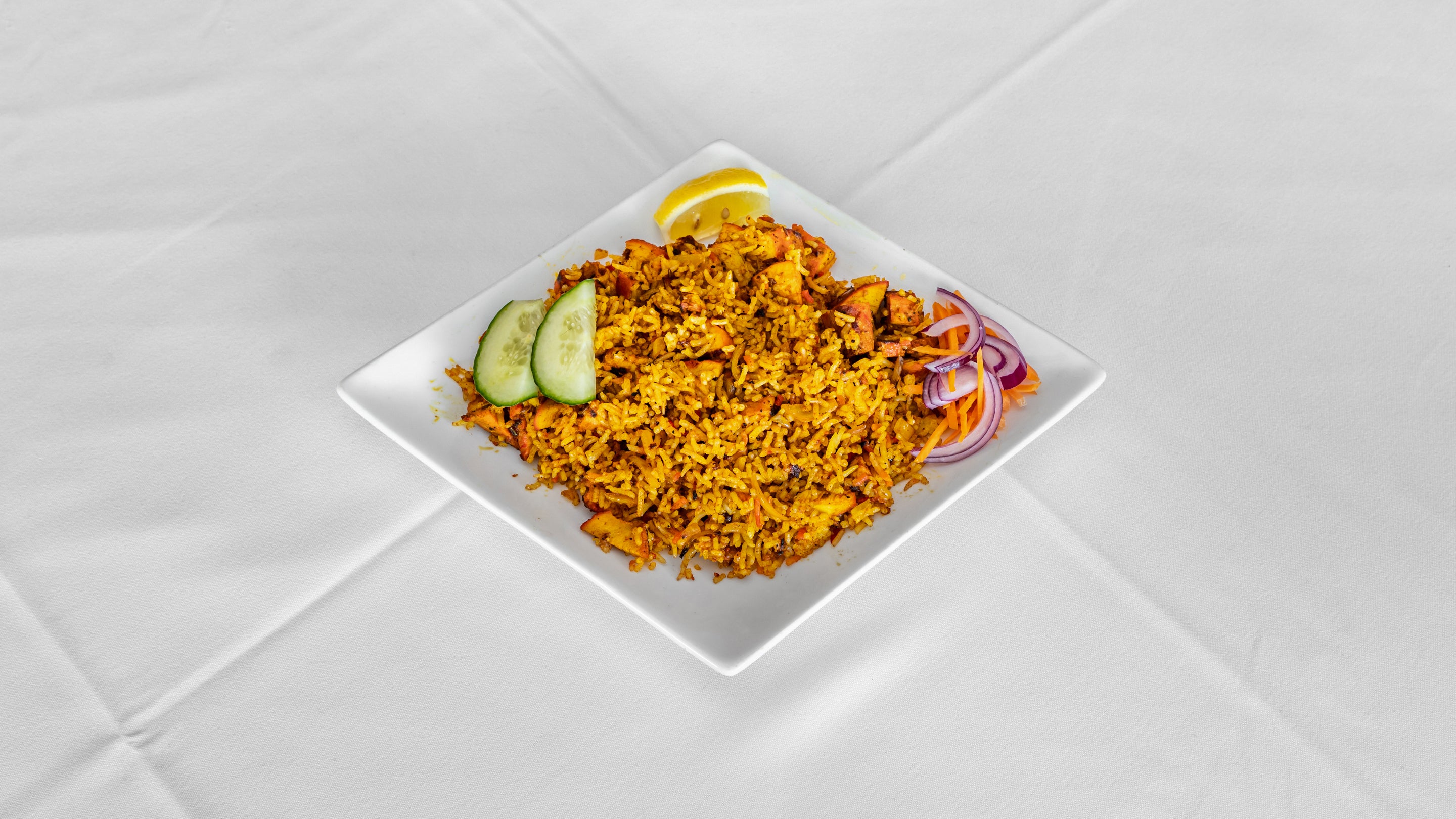 Chicken or Lamb Tikka Biryani