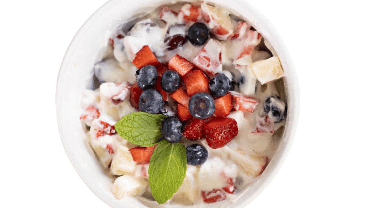 A bowl of fruit and Greek yogurt