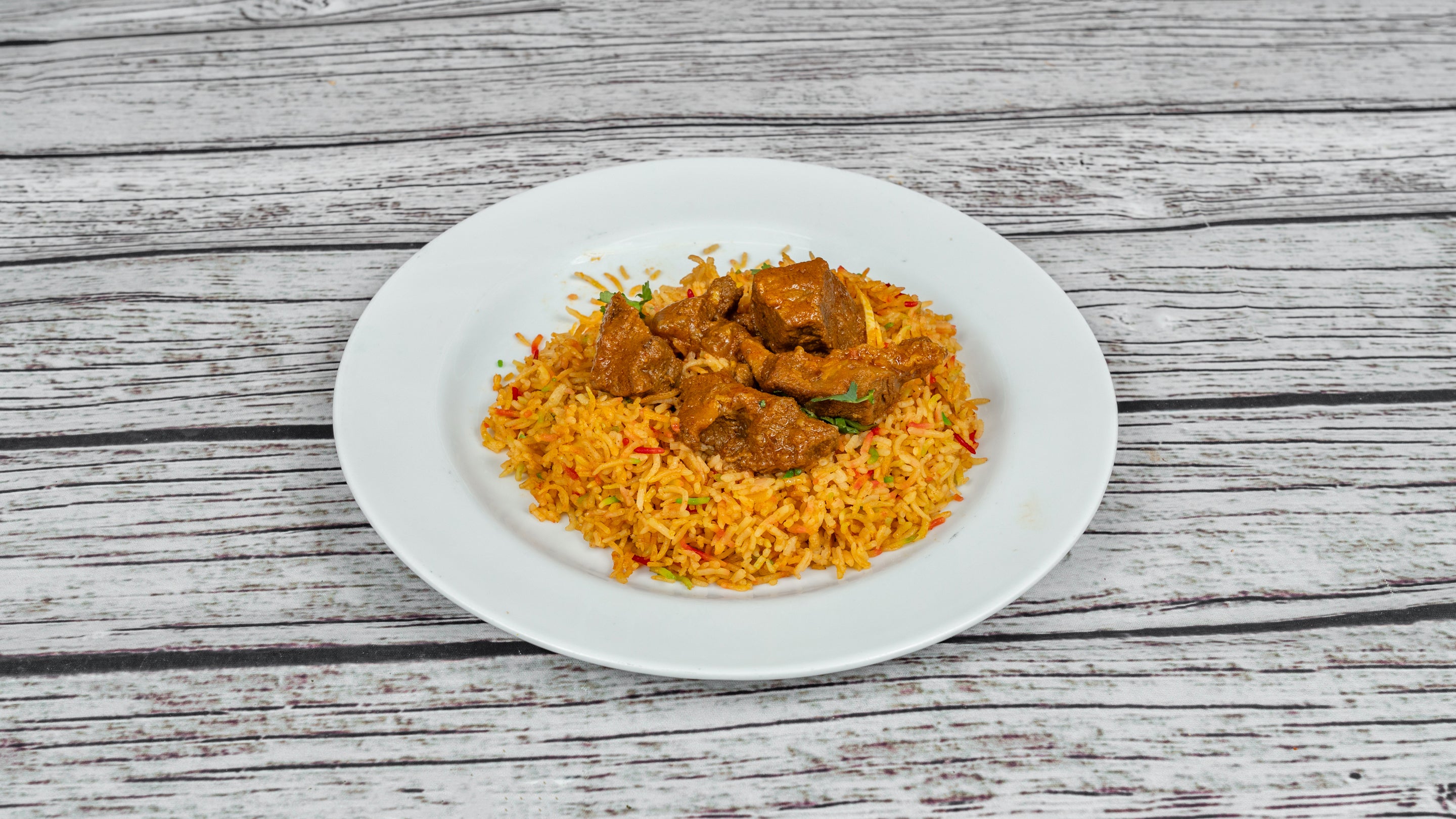 Pilau Rice Lamb Curry on Top