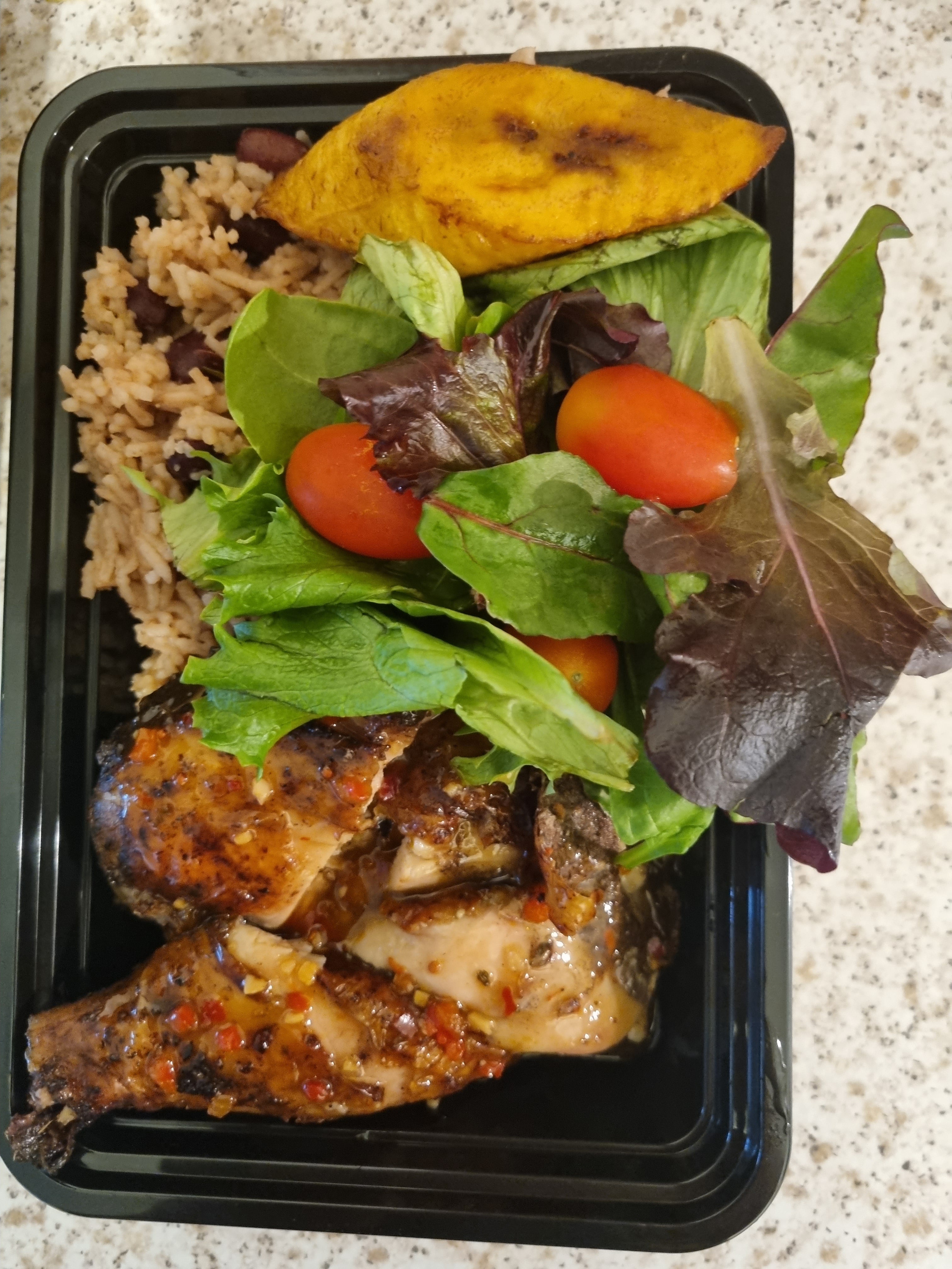 Jerk Chicken served with RICE&PEAS/Salad
