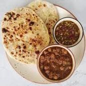 Aloo Gobi Kulcha With Chole And Tamarind Chutney