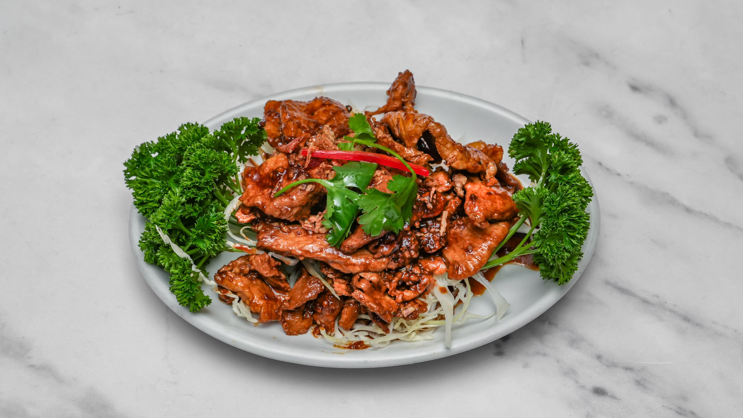 Moo Tord Gra Tiem Prig Tai (Grilled Marinated Pork)