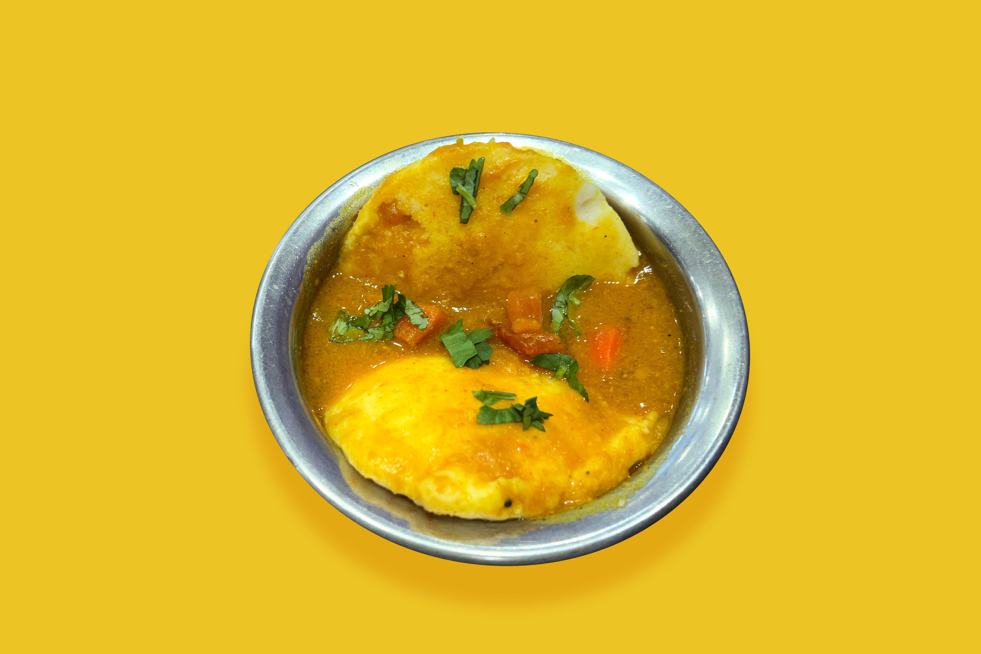 Idli Dipped in Sambar