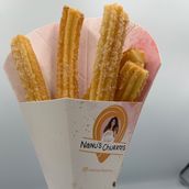 Churros with sugar and cinnamon plus sauce