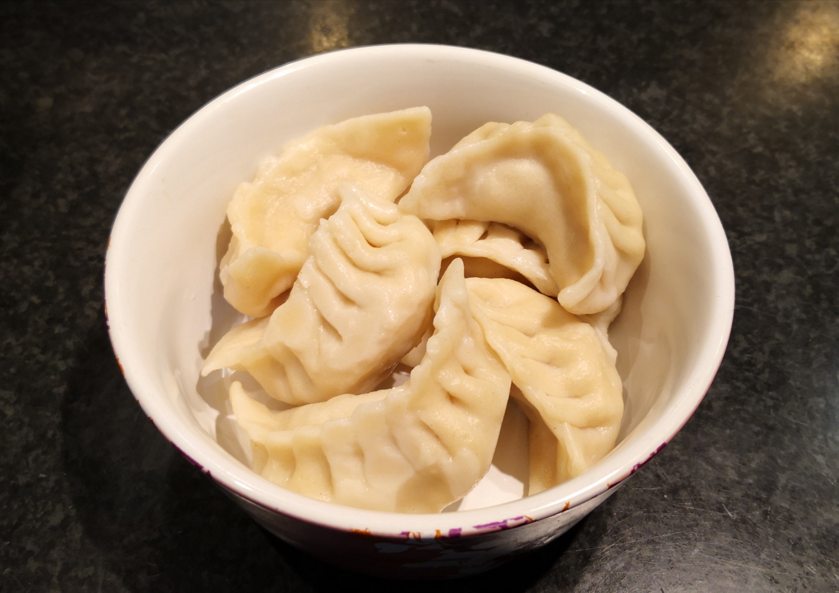 Steamed Pork Dumpling (6) 煮猪肉水饺