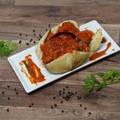 Baked Potato With Lababdar Chicken