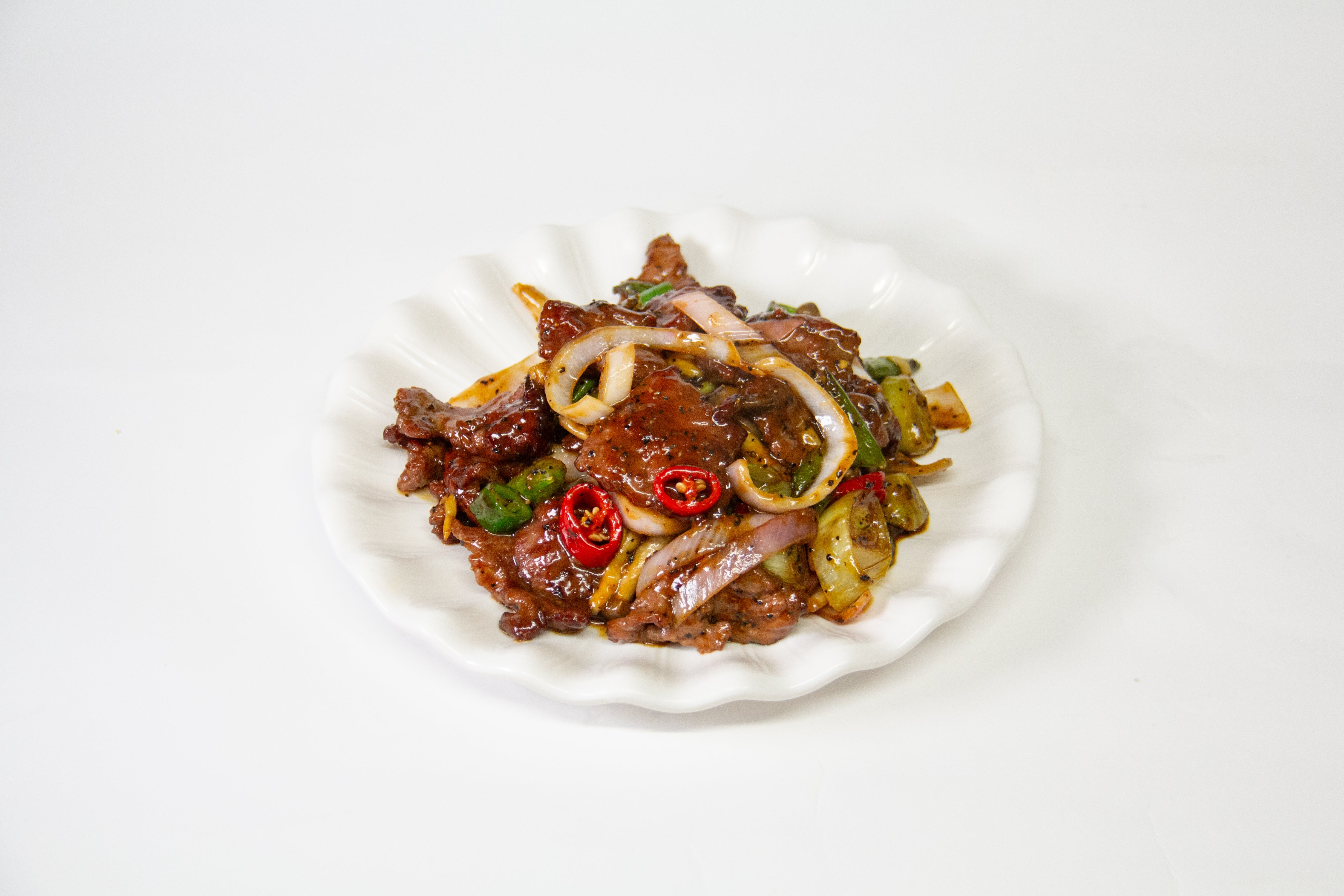 黑椒牛肉片 Sliced beef with snap pea&mushroom in black pepper sauce