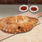 THE UPPER MEAT SIDE CALZONES 