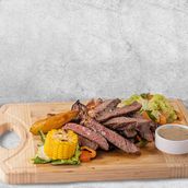 Beef Steak With Roasted Potatoes And Vegetables