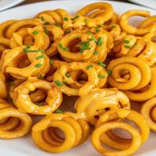 CURLEY CHEESE FRIES
