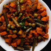 Hamsa bazalia with tomatoes