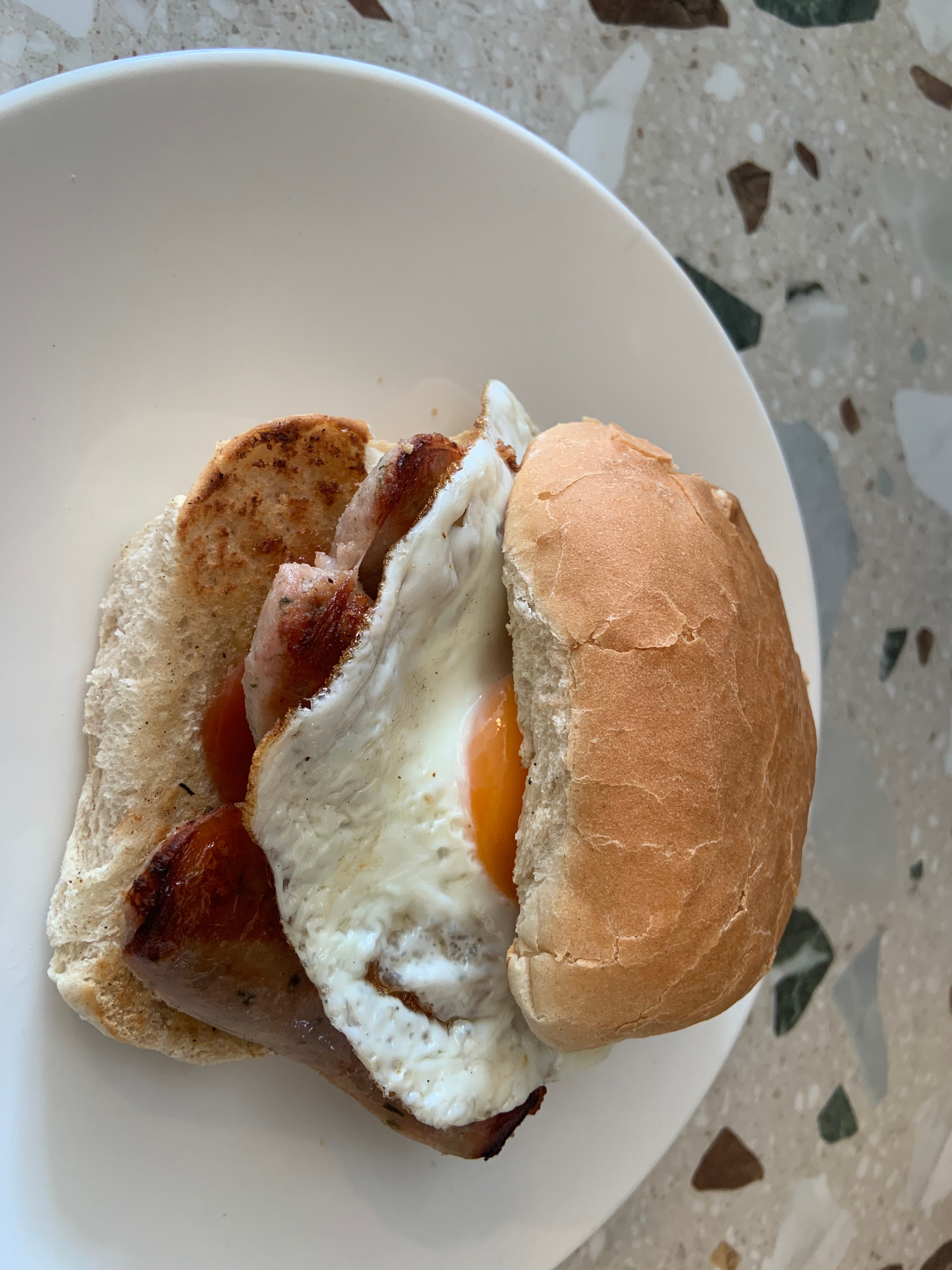 Sausage and fried egg bap