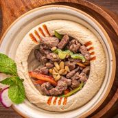 Hummus With Meat And Pine Nuts