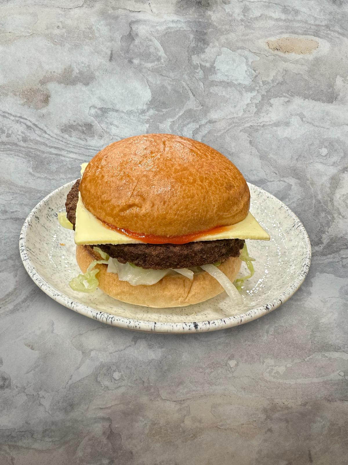 Vegan beef burger in brioche bun